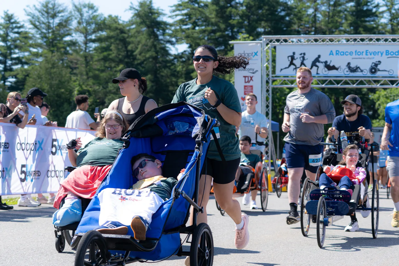 Runners setting off from a Unified 5K start line